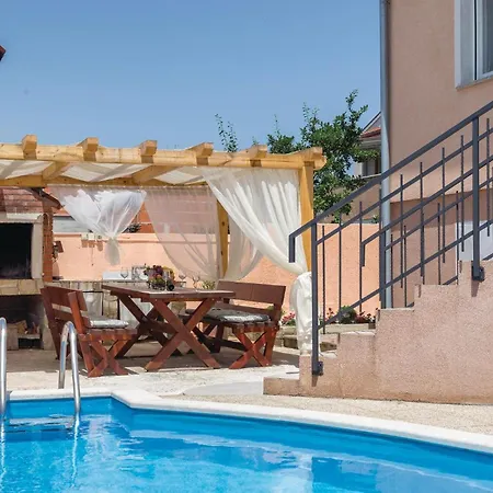 Сasa de vacaciones Cozy In With Kitchen